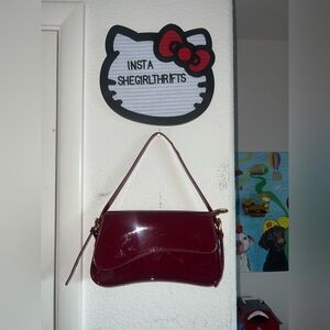 vinyl red shoulder bag